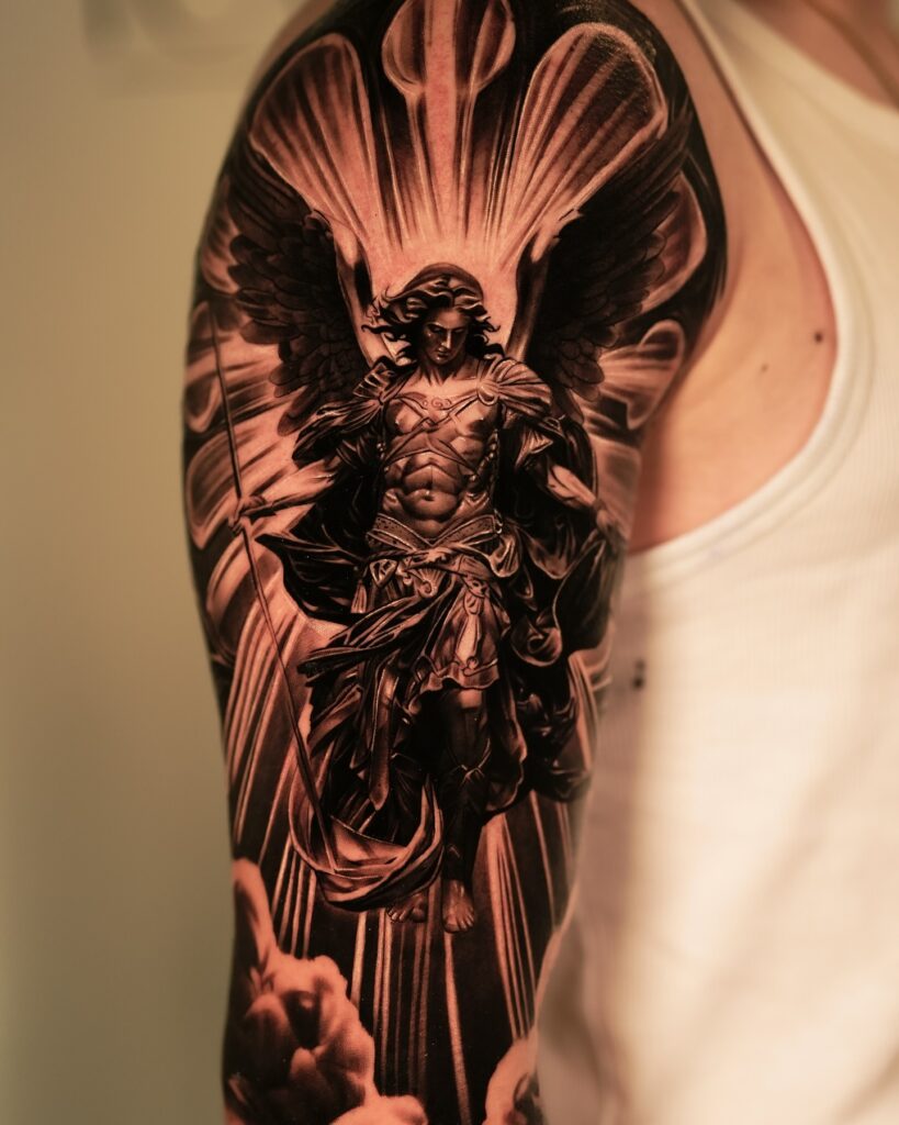 Divine Archangel Sleeve Tattoo angel tattoo ideas tattoo