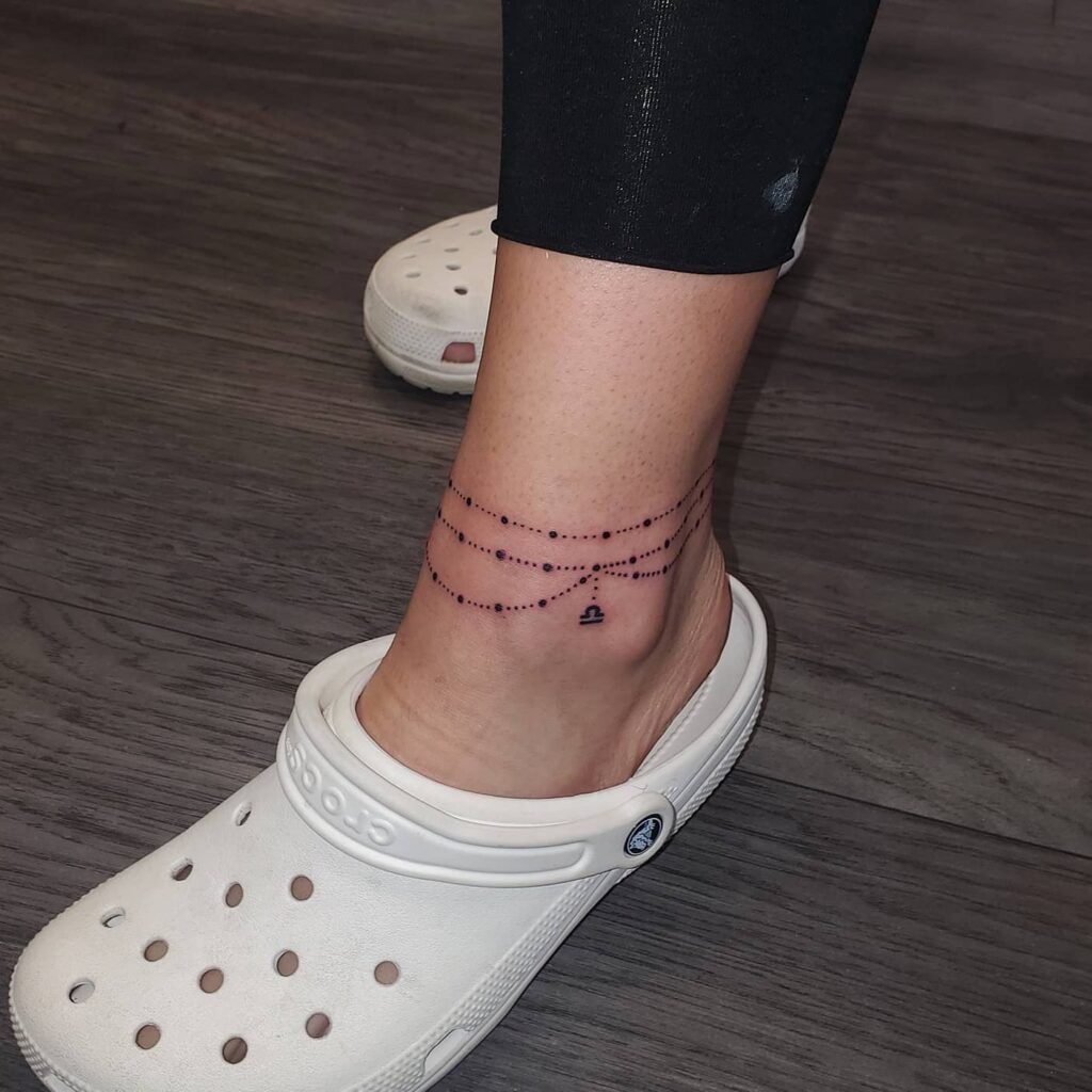 Black And Grey Floral Band Ankle Tattoo