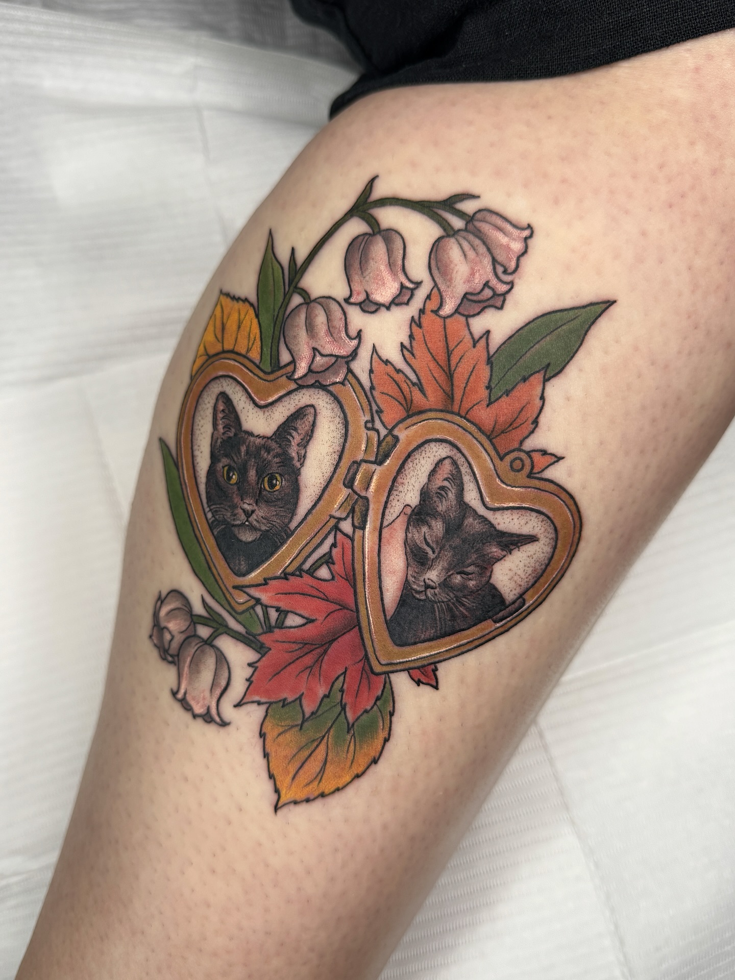 Floral Name And Date Locket Tattoo