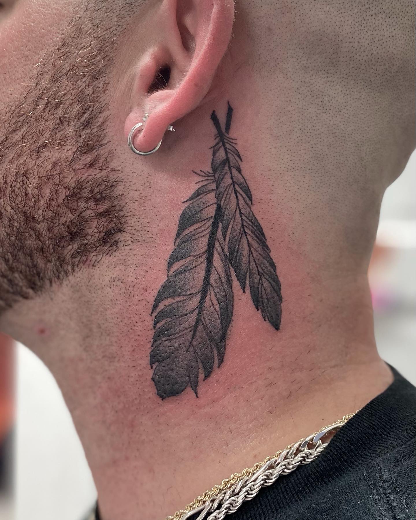 Double Feather Neck Tattoo