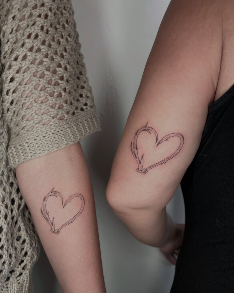 Dual Intertwined Sister Hearts matching family tattoo