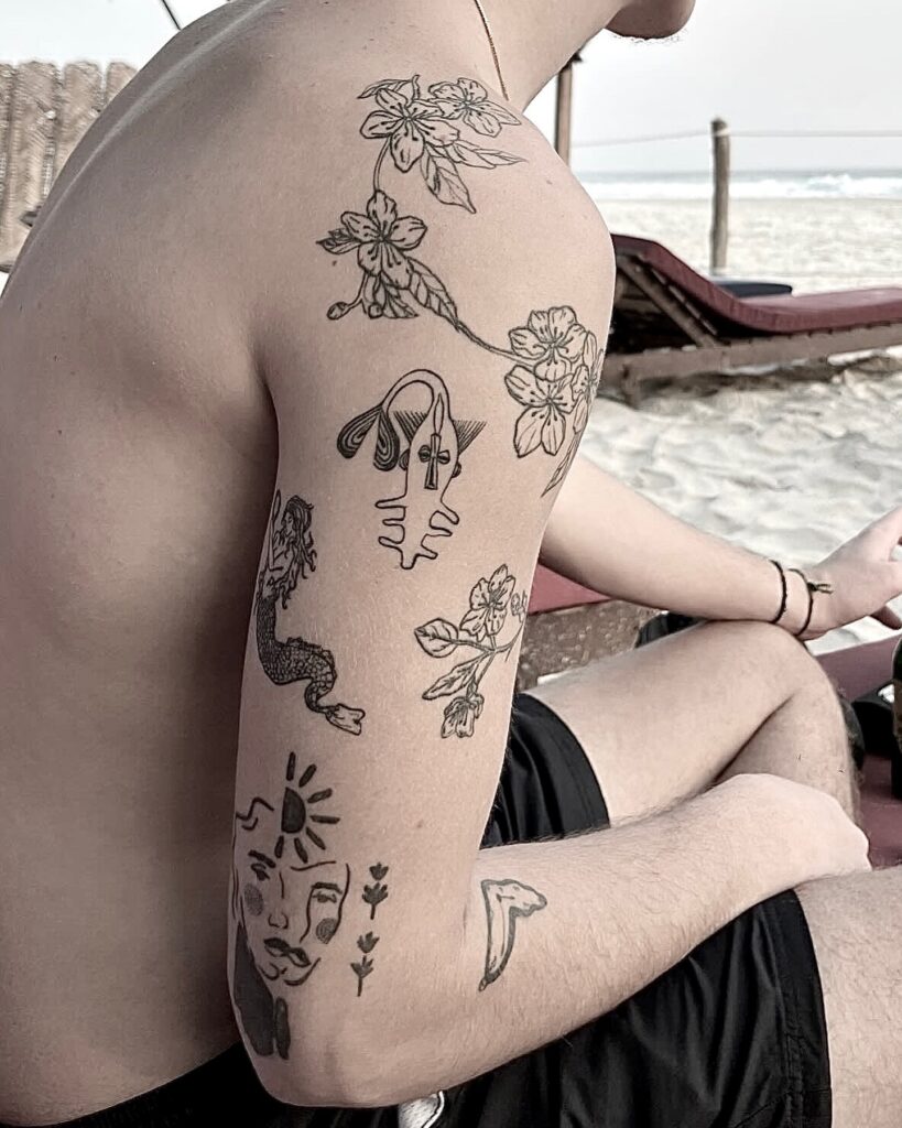 Witty And Bold Patchwork Arm Tattoo