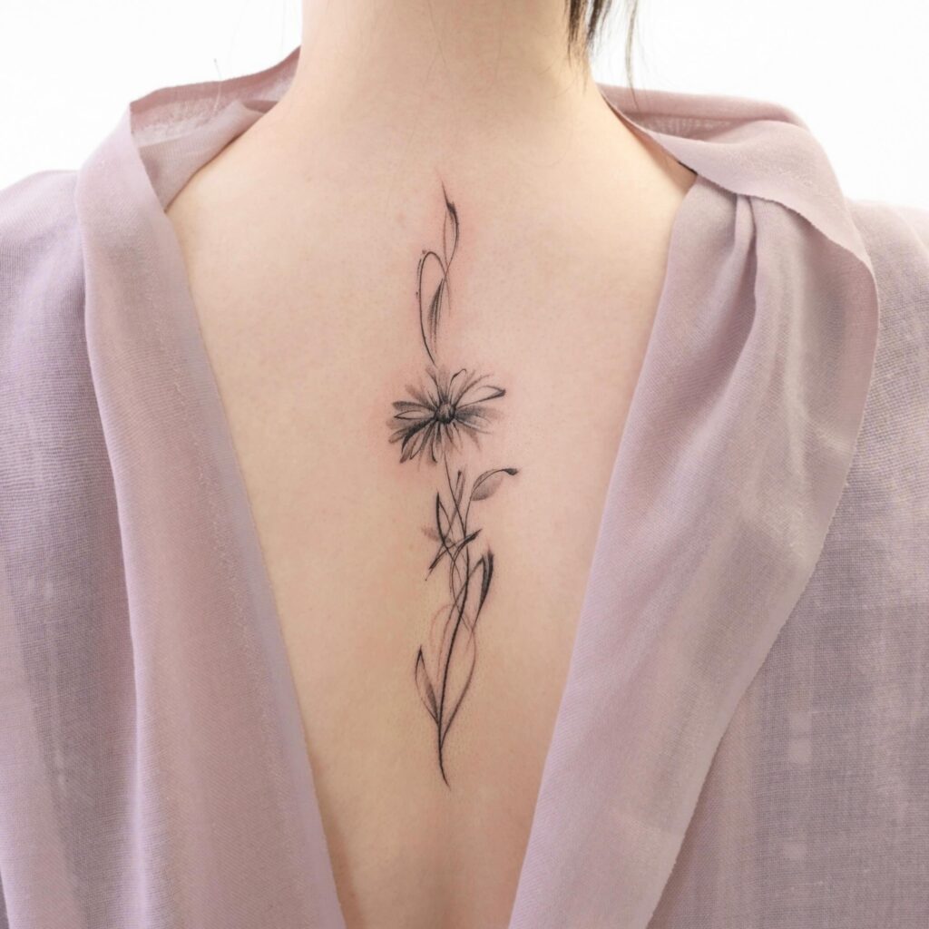 Elegant Back Daisy Tattoo april birth flower tattoo ideas tattoo
