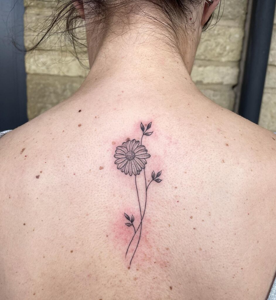 Elegant Daisy Back Tattoo april birth flower tattoo ideas tattoo