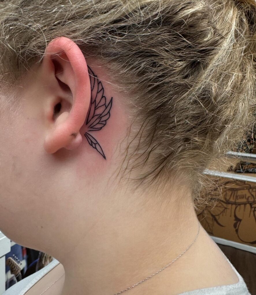 Simple Heart Outline Behind Ear Tattoo