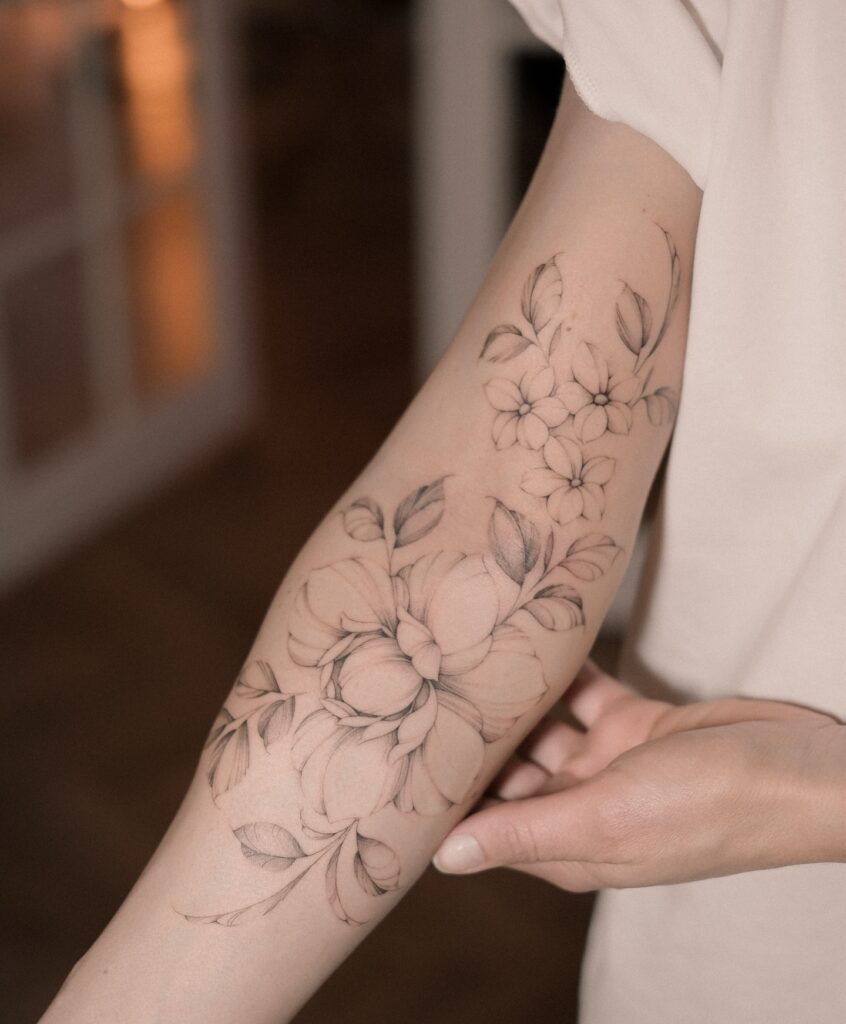 Elegant Fine Line Floral Arm Tattoo fine line tattoos for women tattoo