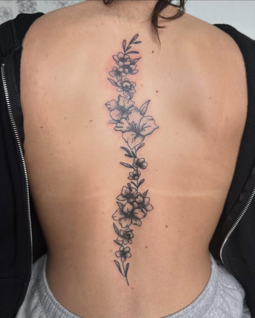 Healing Script Spine Tattoo