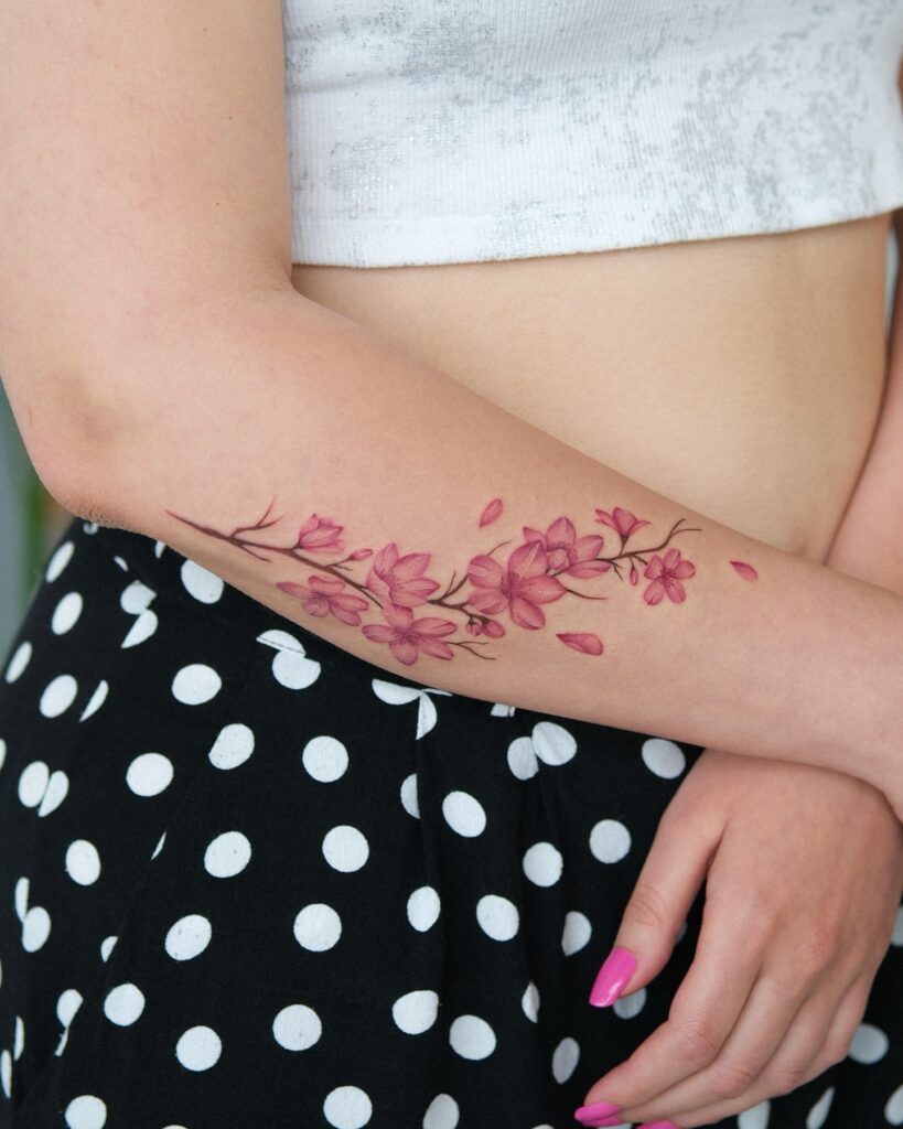 Elegant Forearm Cherry Blossom Wrap Tattoo cherry blossom tattoo ideas tattoo