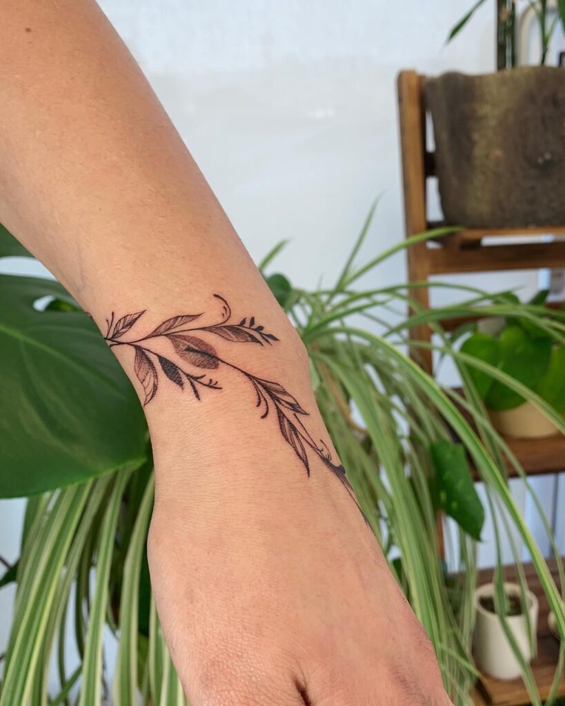 Ornamental Crescent Moon Wrist Tattoo