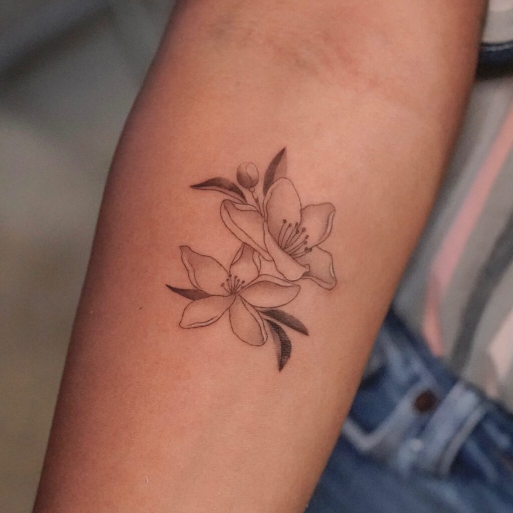 Elegant Lily Bloom Tattoo