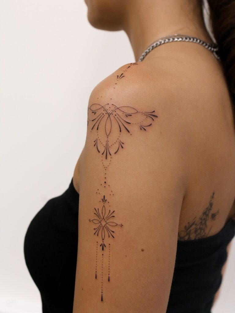 Red Rose And Ornamental Forearm Tattoo