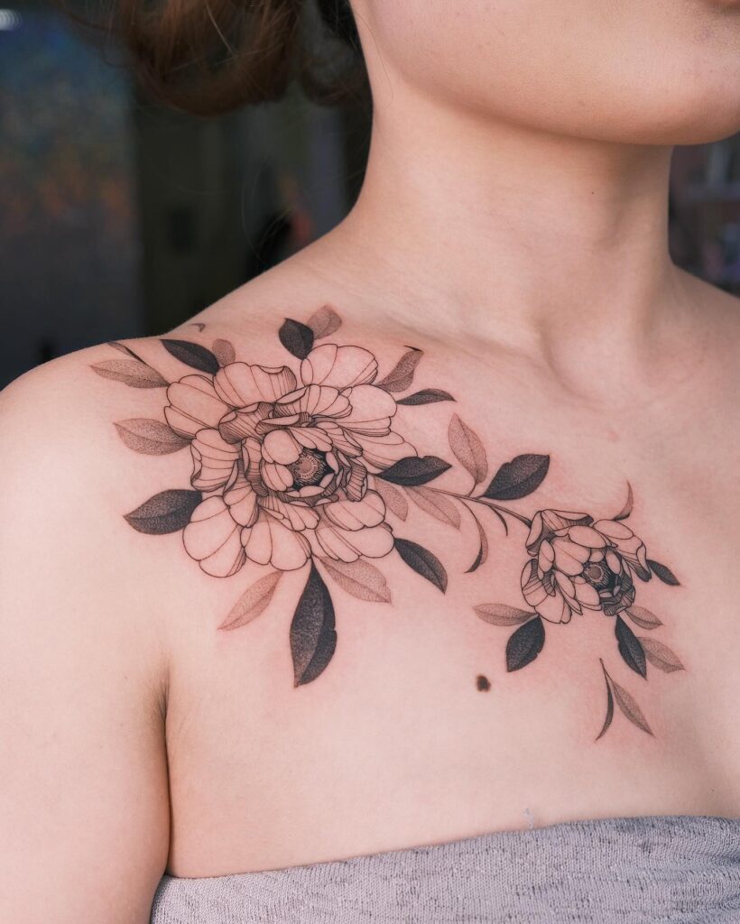 Vibrant Gum Blossom Collarbone Tattoo