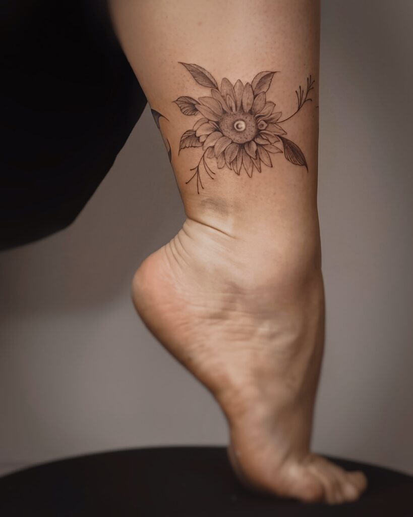 Elegant Sunflower Ankle Tattoo sunflower tattoos tattoo