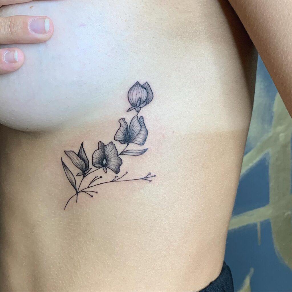 Elegant Sweet Pea Rib Tattoo april birth flower tattoo ideas tattoo