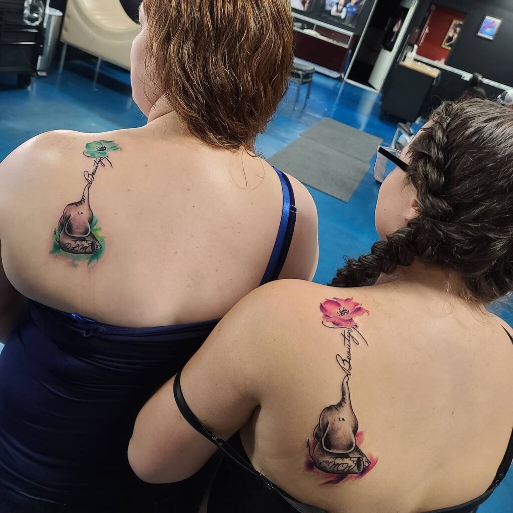 Elephant and Flower Mother-Daughters Tattoo mother and daughter tattoo ideas tattoo