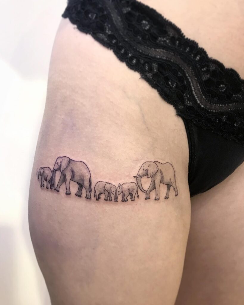 Elephant Family Thigh Band Tattoo elephant family tattoo ideas tattoo