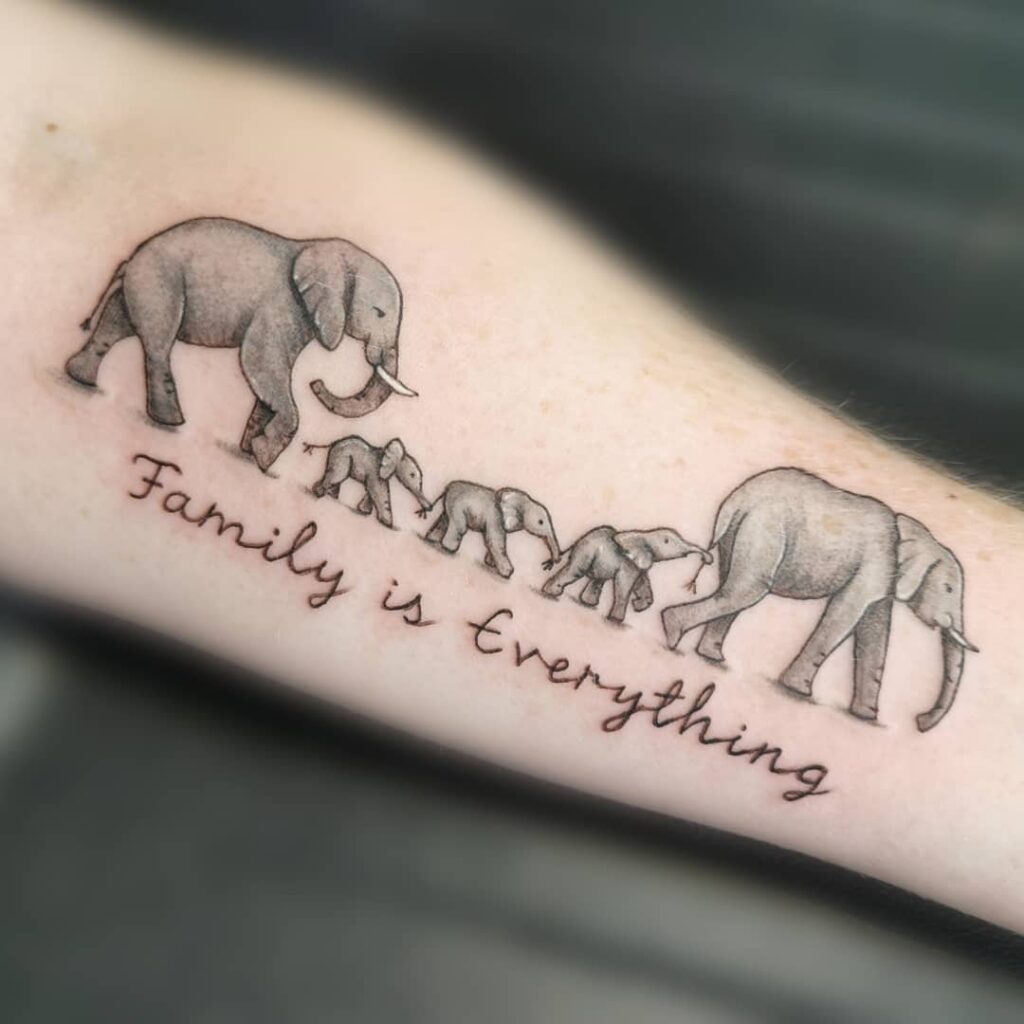 Elephant Parade with Quote Tattoo elephant family tattoo ideas tattoo