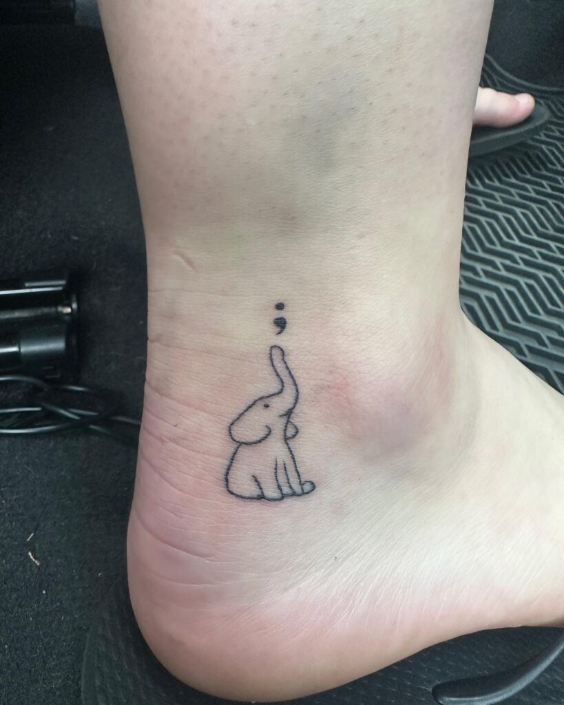 Elephant Semi-Colon Tattoo meaningful semicolon tattoo ideas tattoo