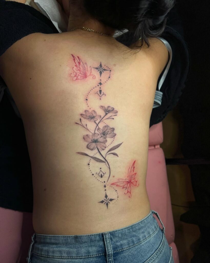 Wild Botanical Spine Tattoo