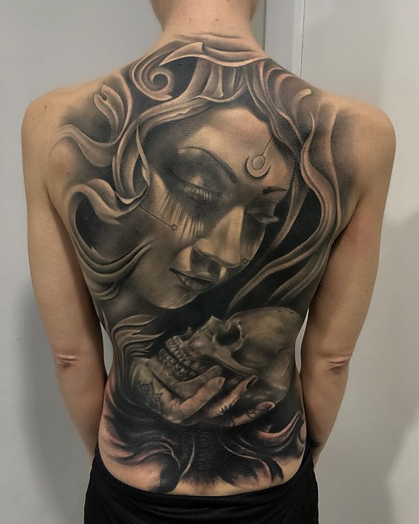 Enigmatic Woman and Skull Back Tattoo back tattoos for guys tattoo