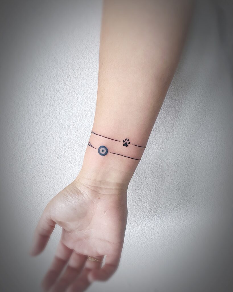 Radiant Mandala-Inspired Wrist Tattoo