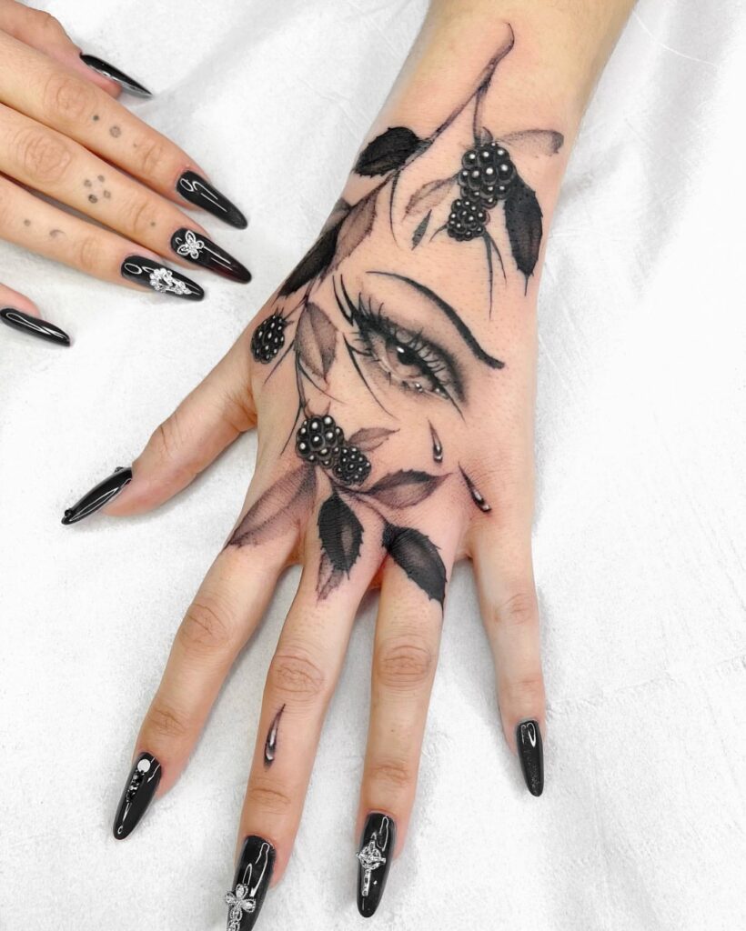 Embrace Of Despair Hand Tattoo