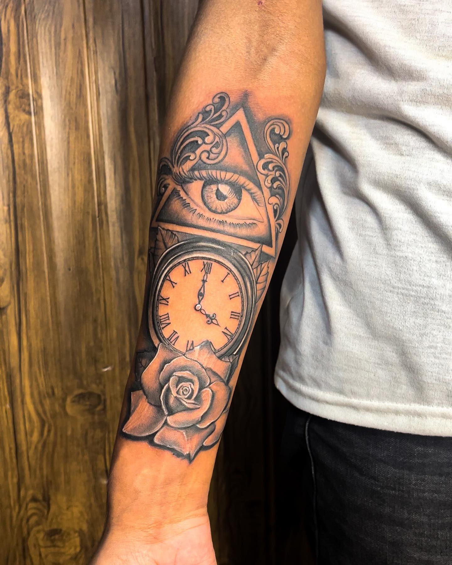 Eye and Clock Tattoo With Rose clock tattoo ideas tattoo