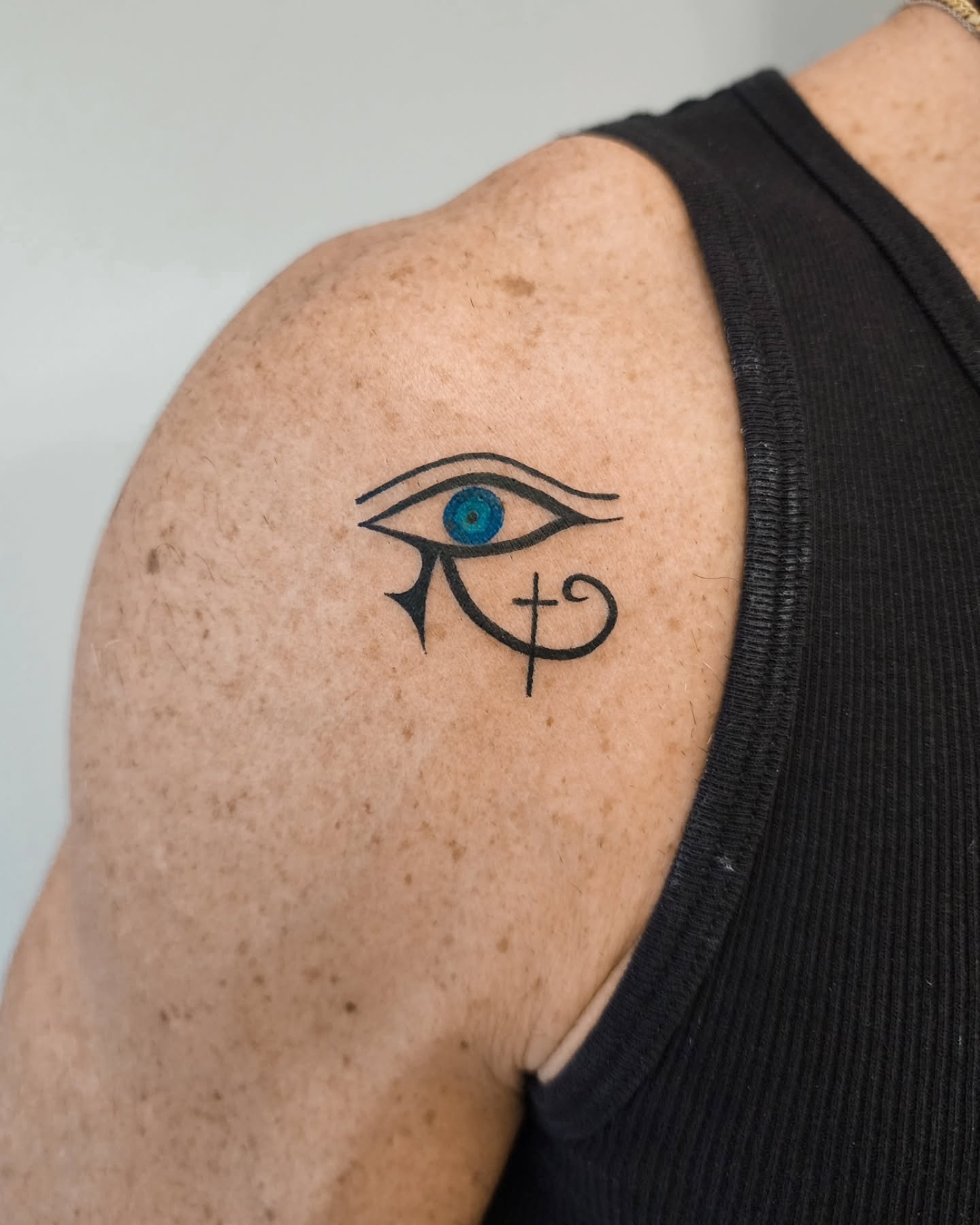 Blue Eye Of Horus And Ankh Tattoo