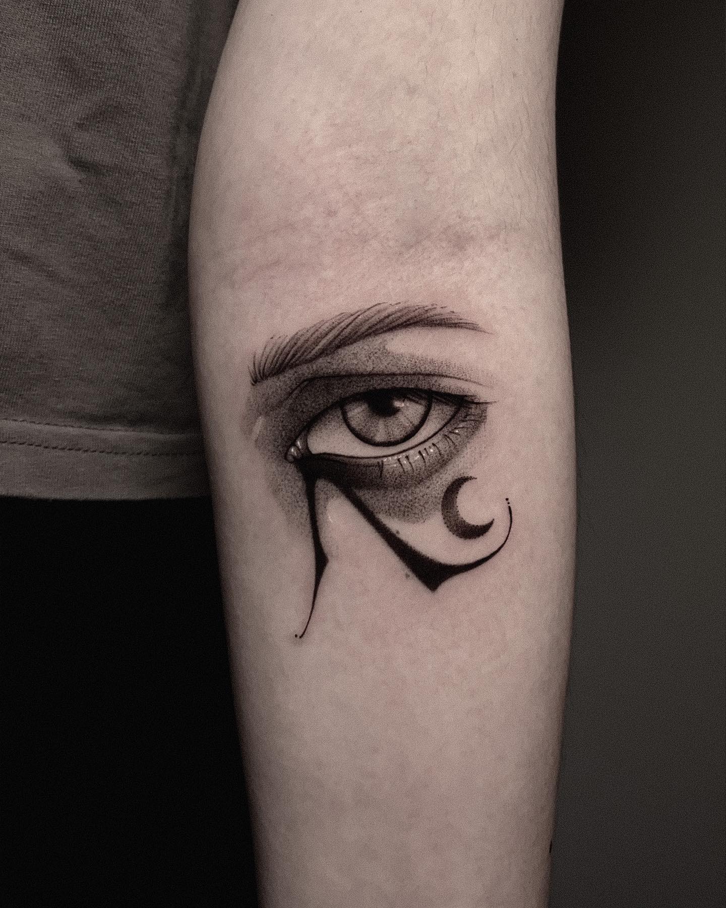 Realistic Eye Of Horus Crescent Moon Tattoo