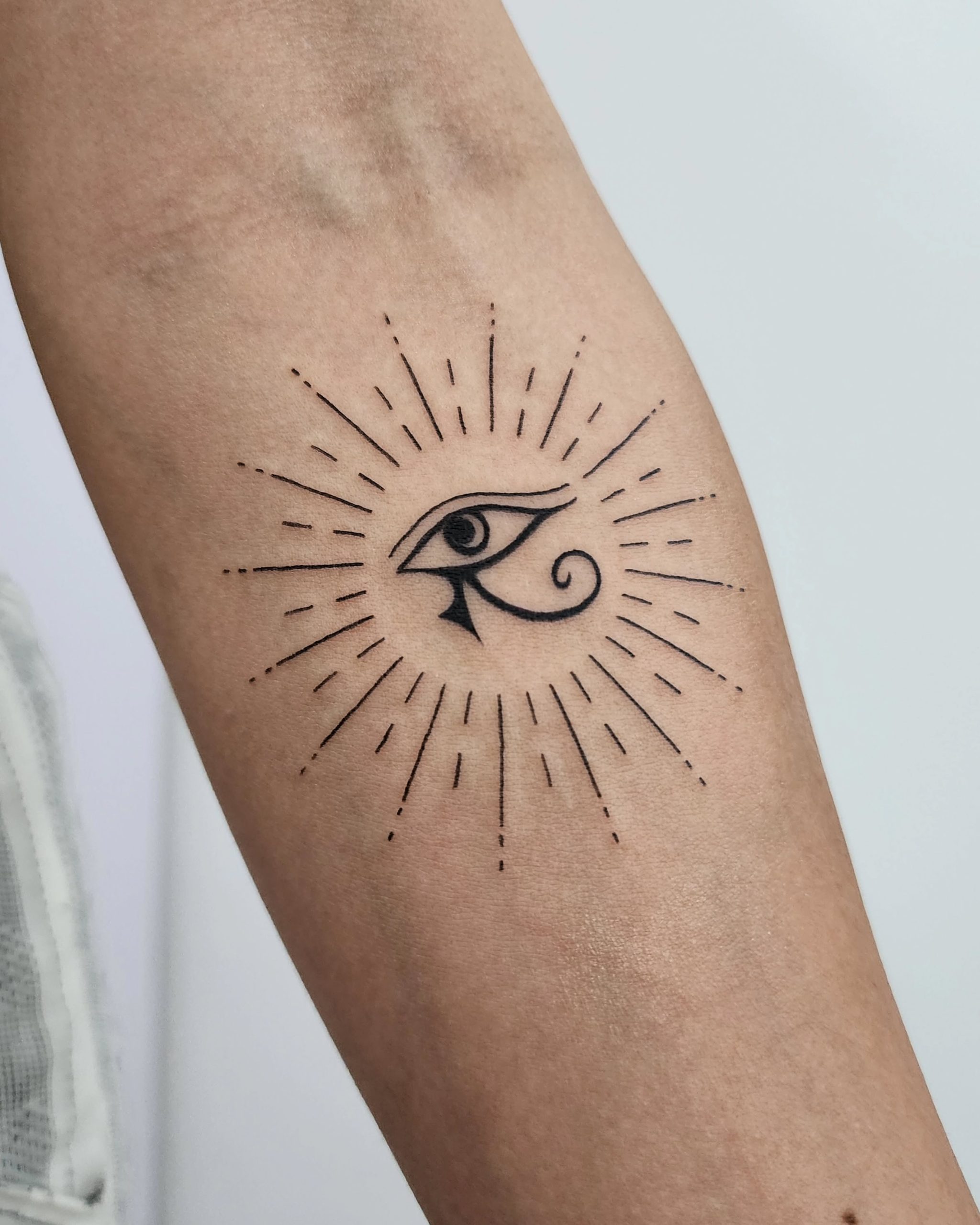 Sunburst Eye Of Horus Tattoo