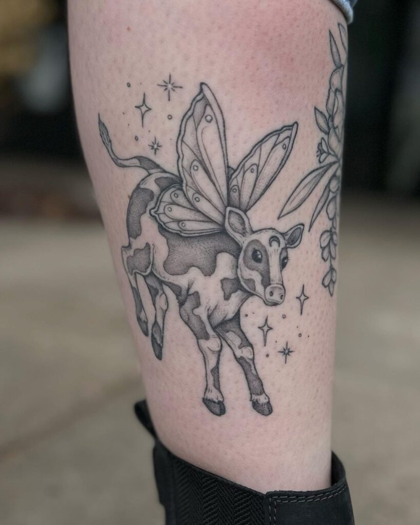 Goat Skull with Flowers and Moths Thigh Tattoo mystical tattoos tattoo