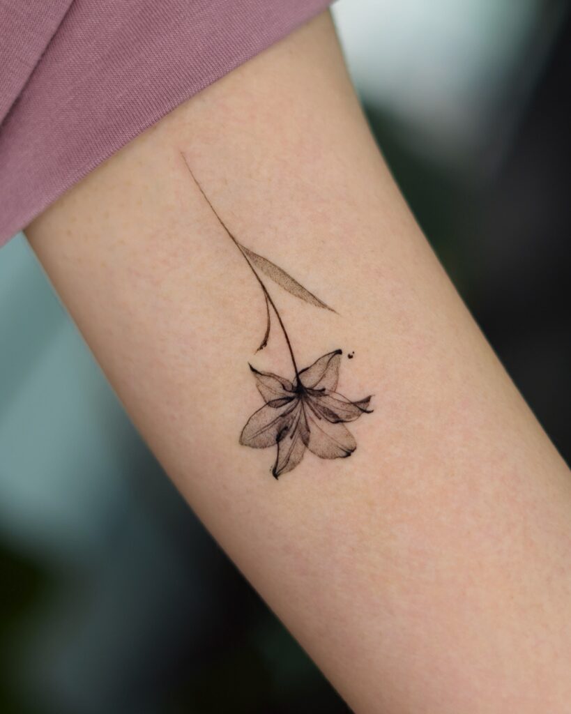 Falling Petal Flower Tattoo minimal tiny flower tattoo ideas tattoo