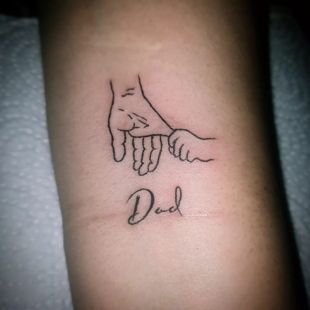 Father and Child Hands Tattoo dad tattoo ideas tattoo