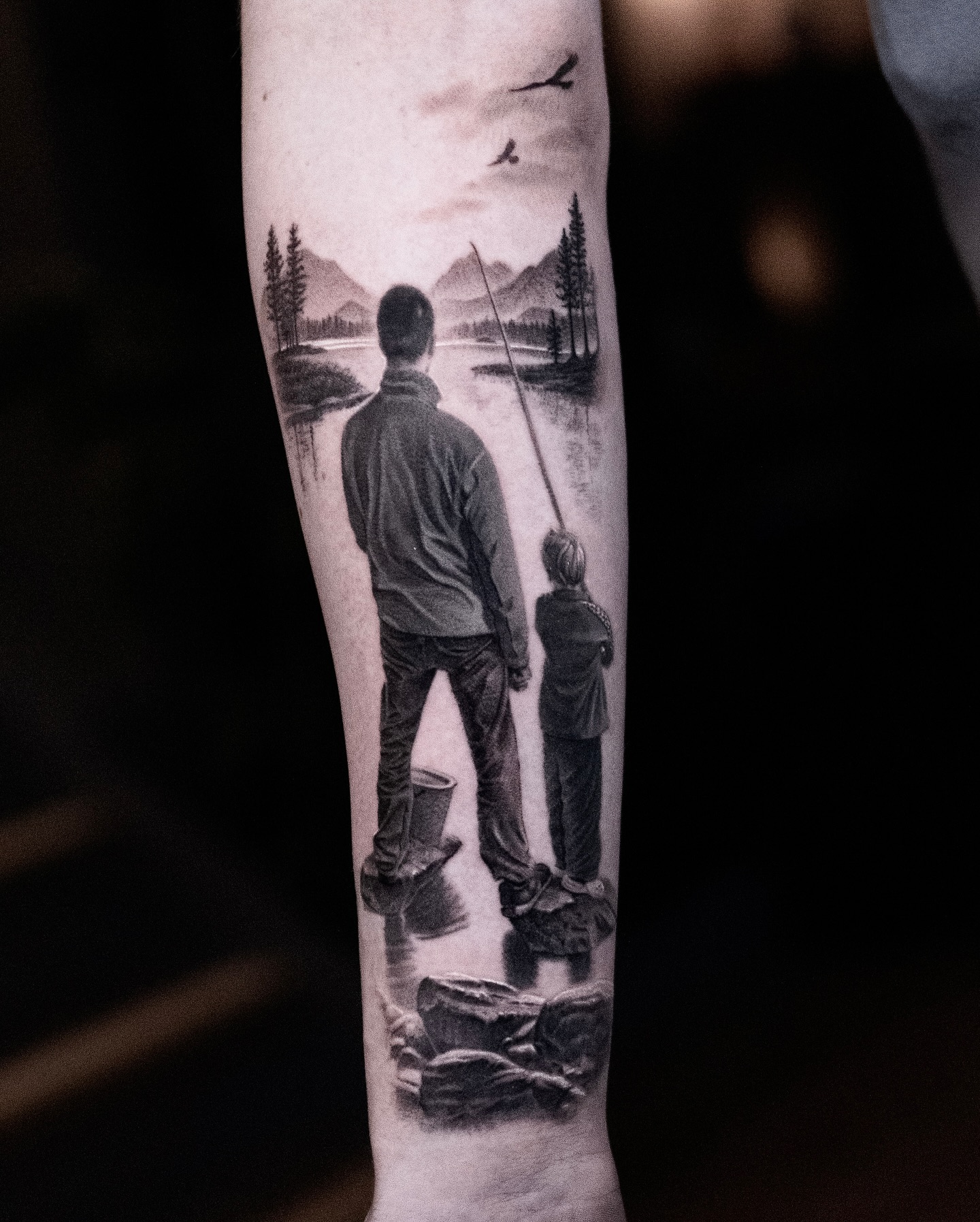 Father and Son Fishing Tattoo by the Lake father and son tattoos tattoo