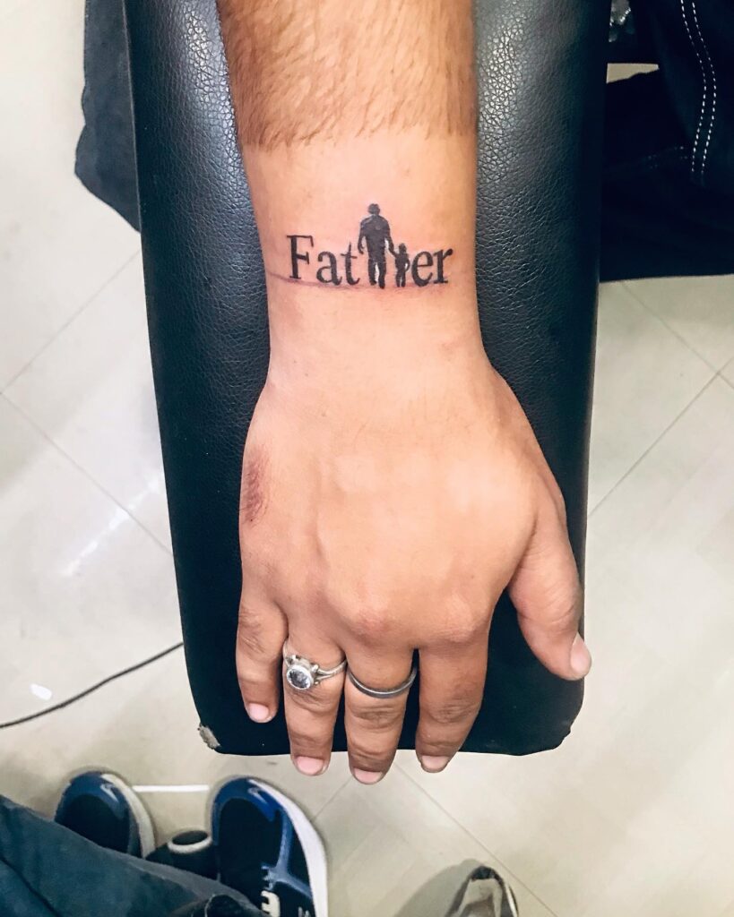 Father-Daughter Silhouette Wrist Tattoo dad tattoo ideas tattoo