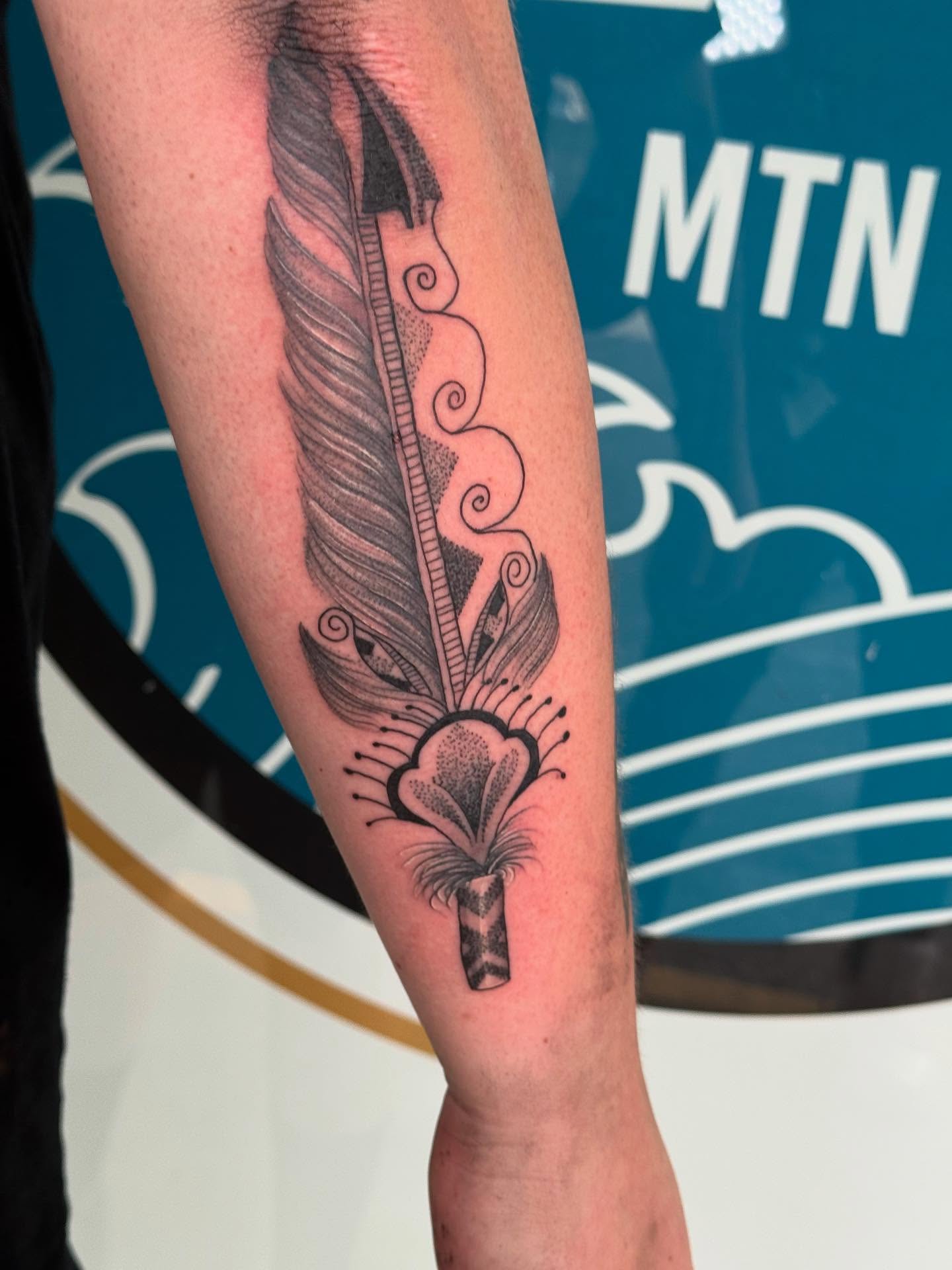 Tribal Feather Tattoo