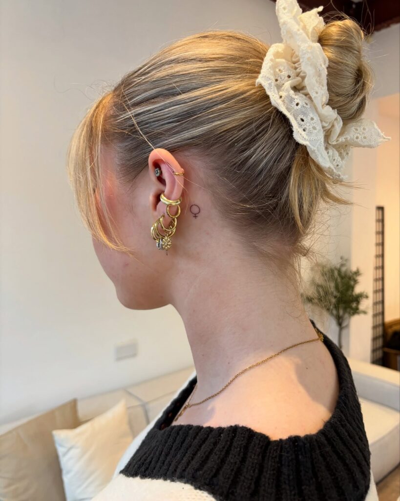 Minimal Heart Outline Behind The Ear Tattoo Design