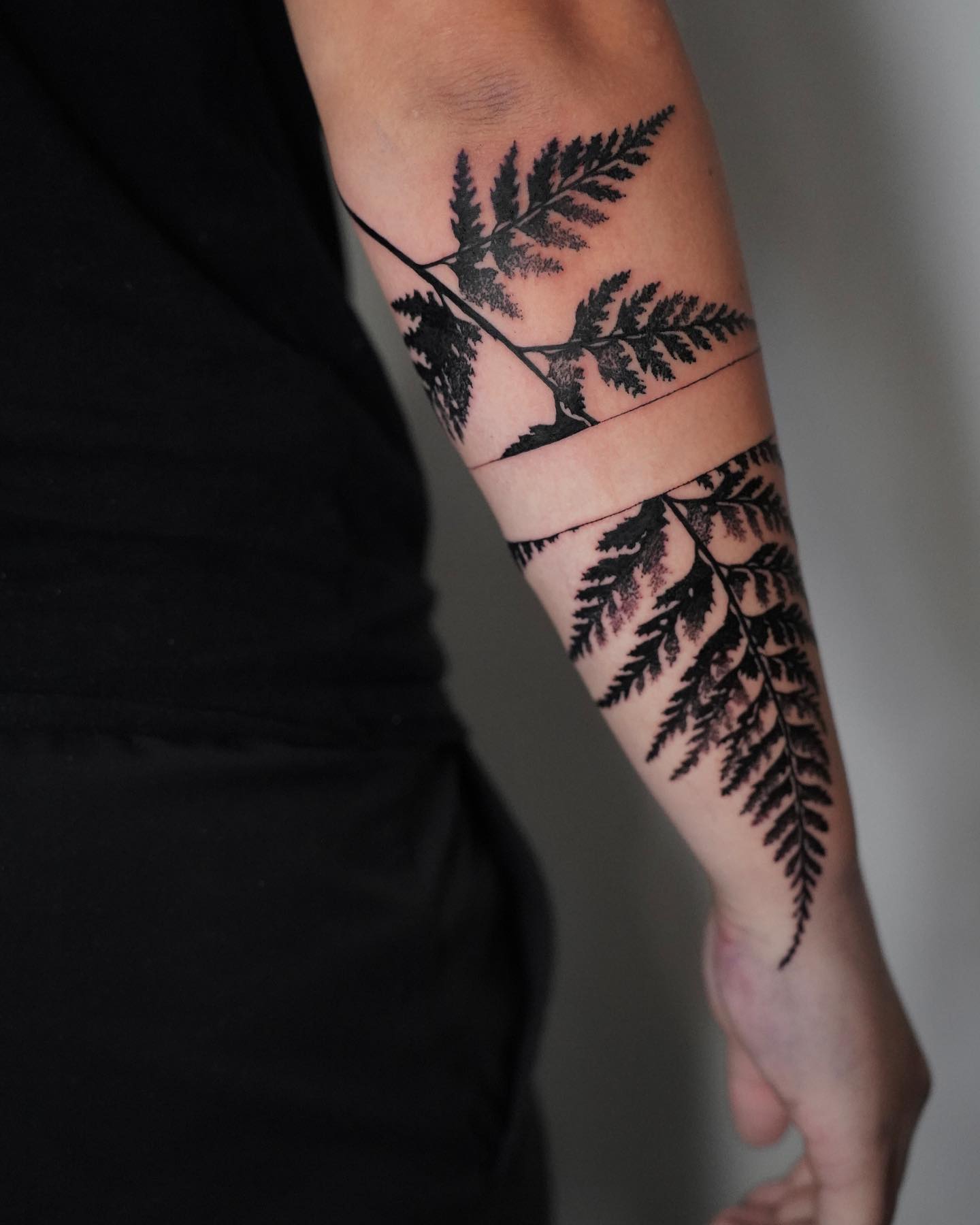 Fern Branch Forearm Tattoo