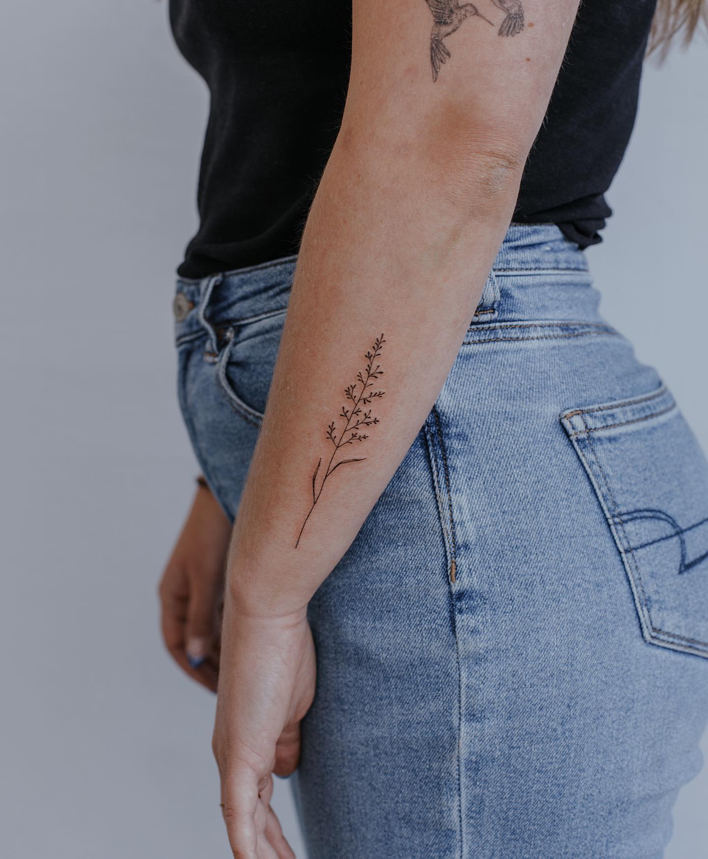 Minimalist Fern Sprig Tattoo