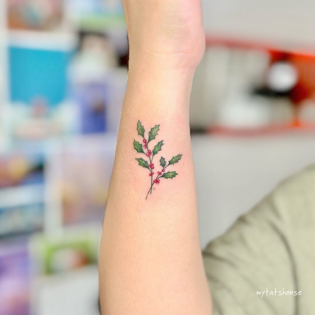 Festive Holly Wrist Tattoo in Color december birth flower tattoo ideas tattoo
