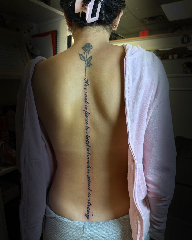 Sword And Butterfly Spine Tattoo