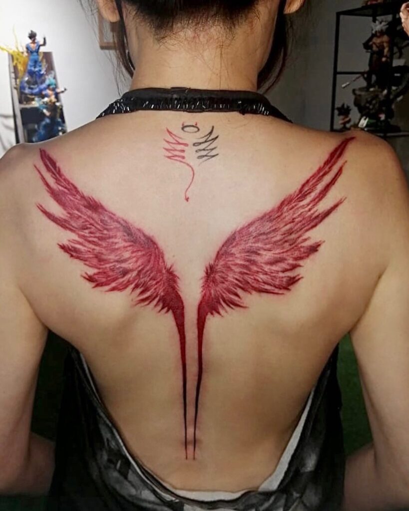 Fiery Red Angel Wings with Symbolic Script Tattoo angel wings tattoo ideas on back tattoo