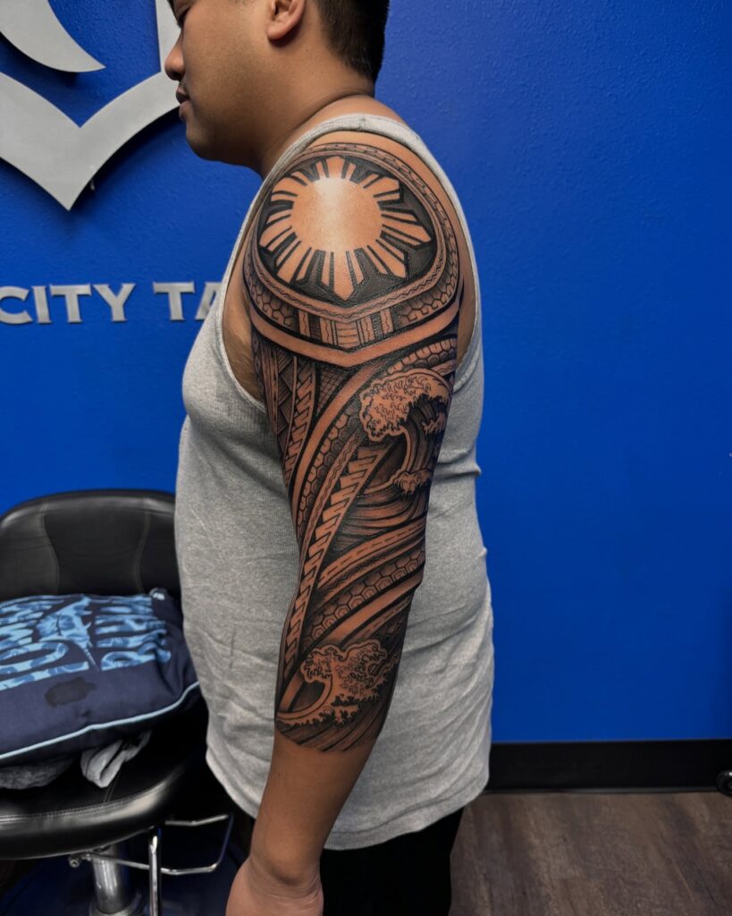Polynesian Tribal Arm Sleeve Tattoo