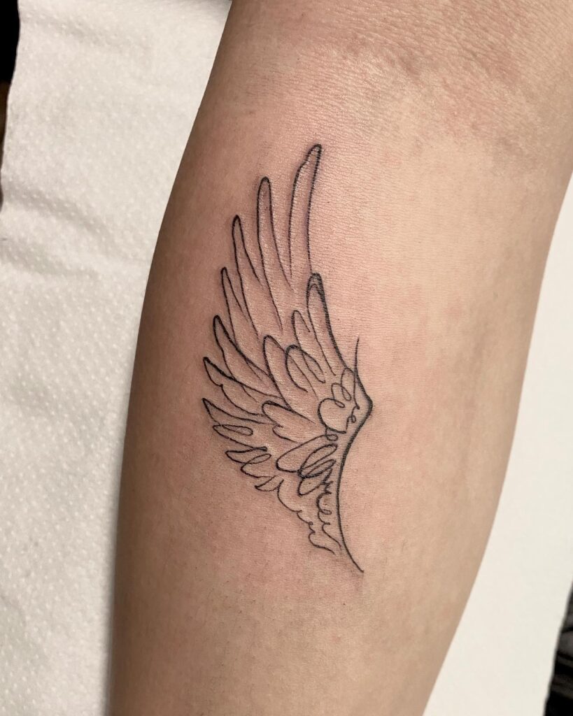 Fine Line Angel Wing Tattoo on Arm angel wings tattoo ideas tattoo