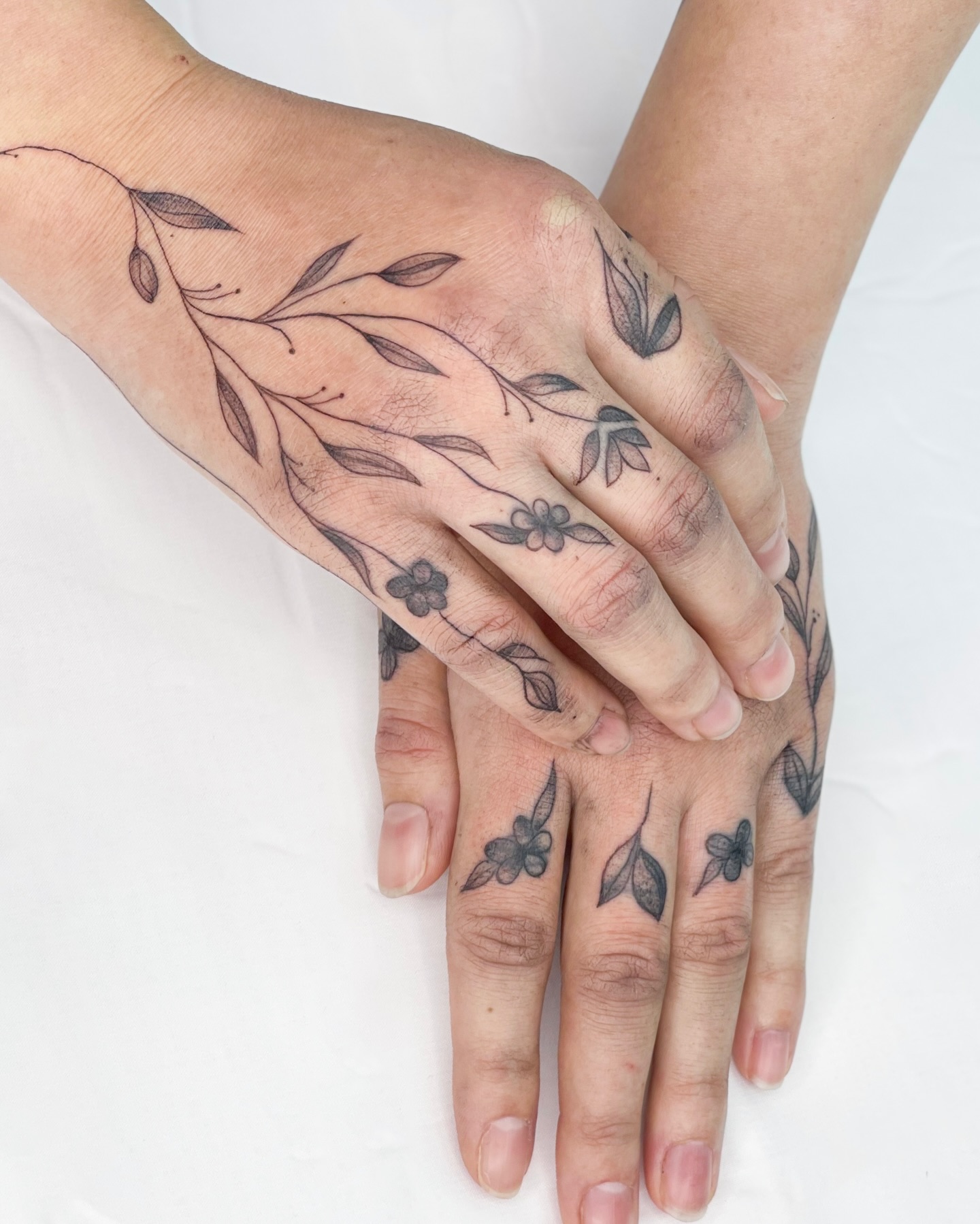 Floral Butterfly Hand Tattoo