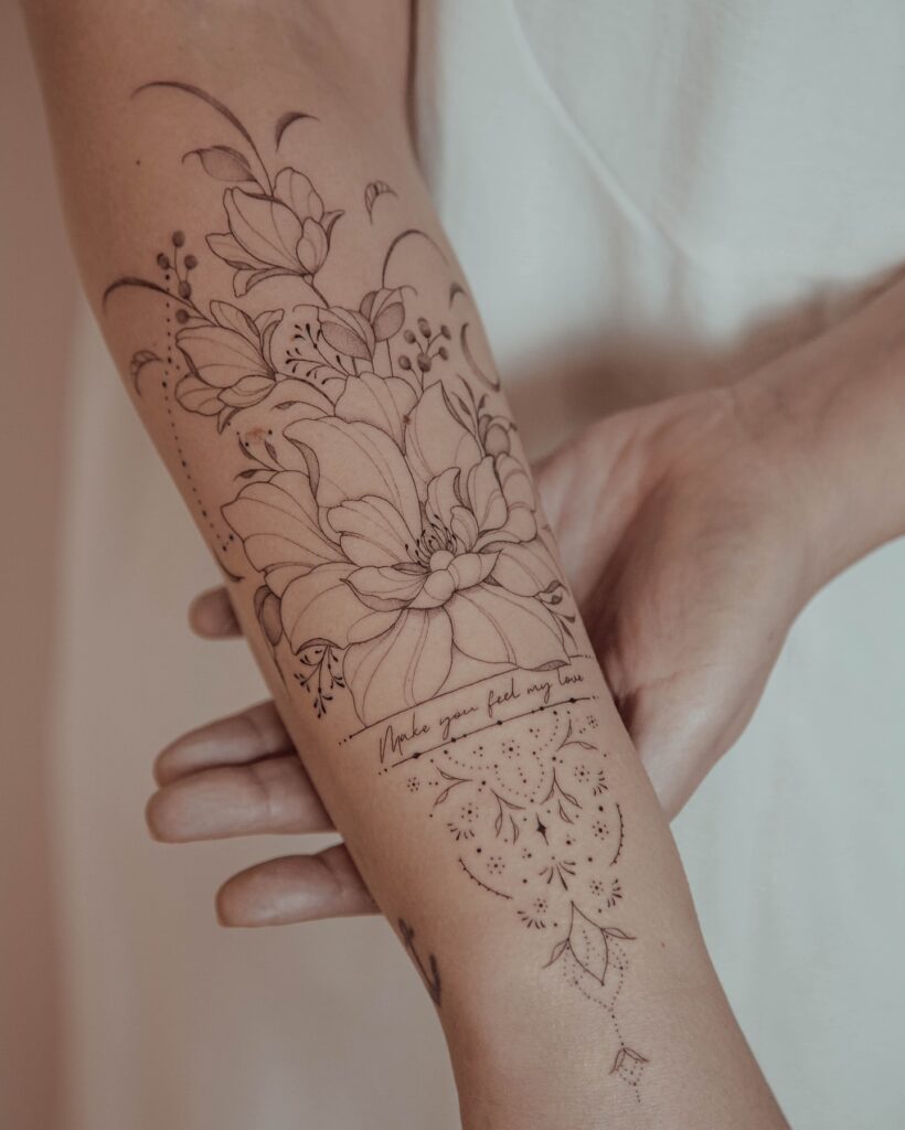Fine Line Botanical with Cursive Script tattoo