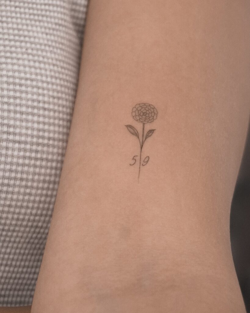 Fine Line Flower with Number Tattoo fine line tattoos for women tattoo