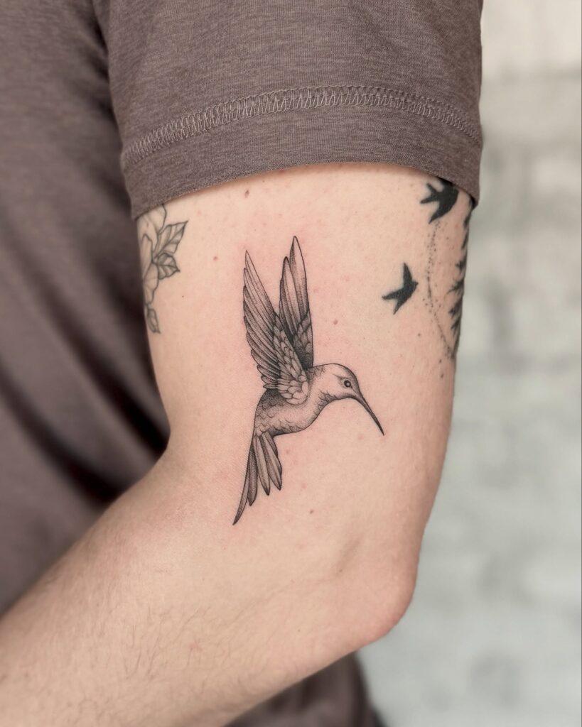 Fine Line Hummingbird on Upper Arm hummingbird tattoos tattoo