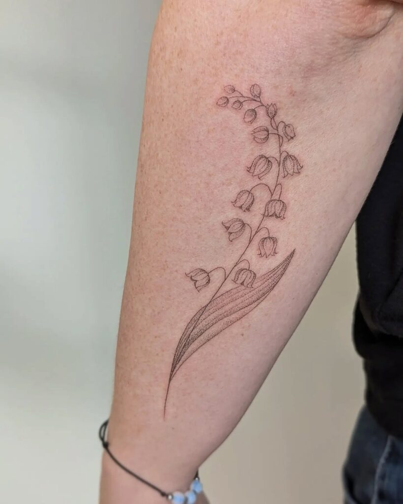 Fine Line Lily of the Valley Tattoo on Forearm may birth flower tattoos tattoo
