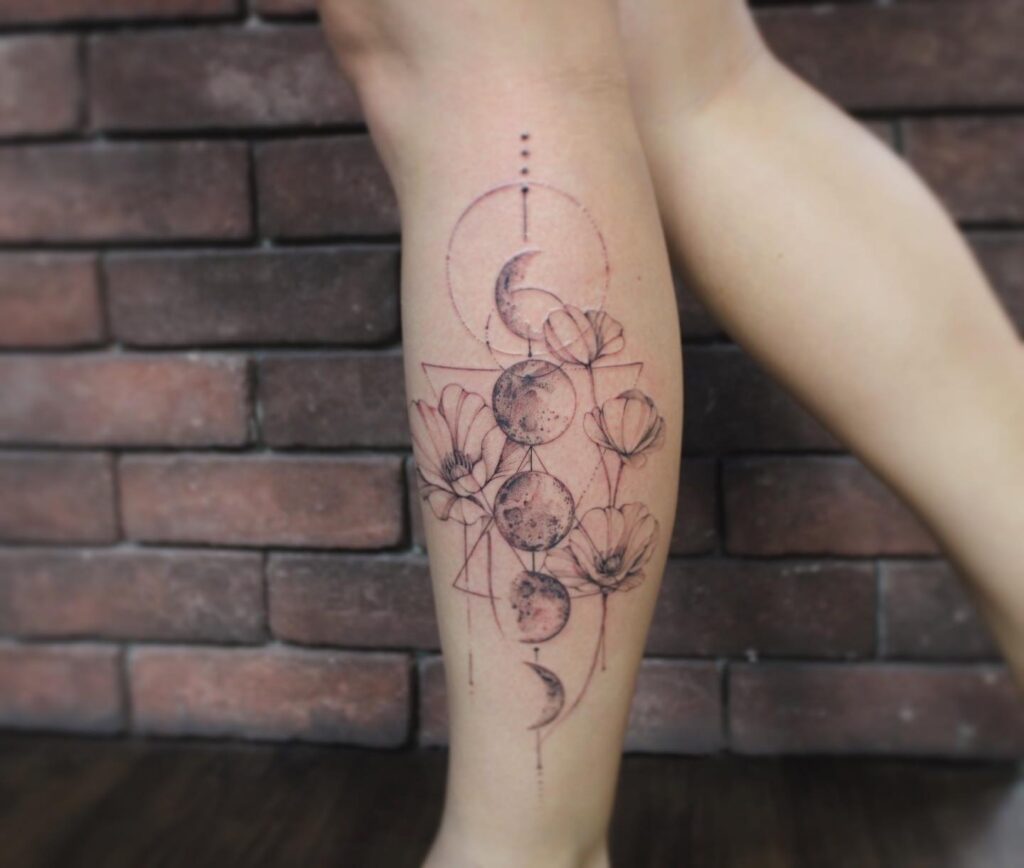 Moon phases with poppy botanical tattoo on arm
